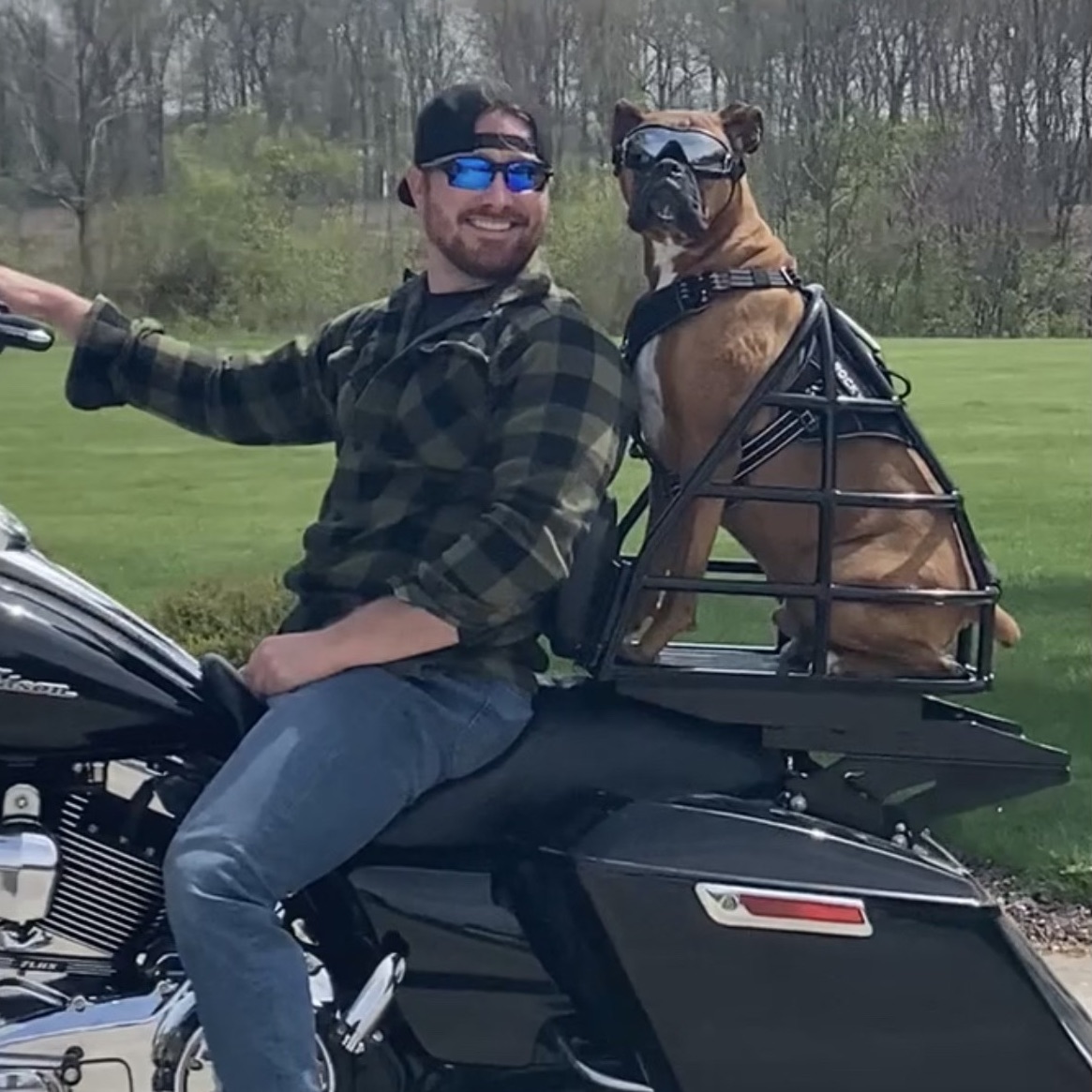 Jake and Rocky on a Harley-Davidson Road King